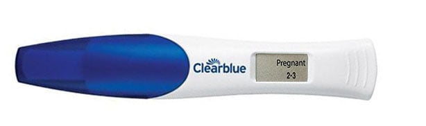 Digital pregnancy test displaying a pregnant result